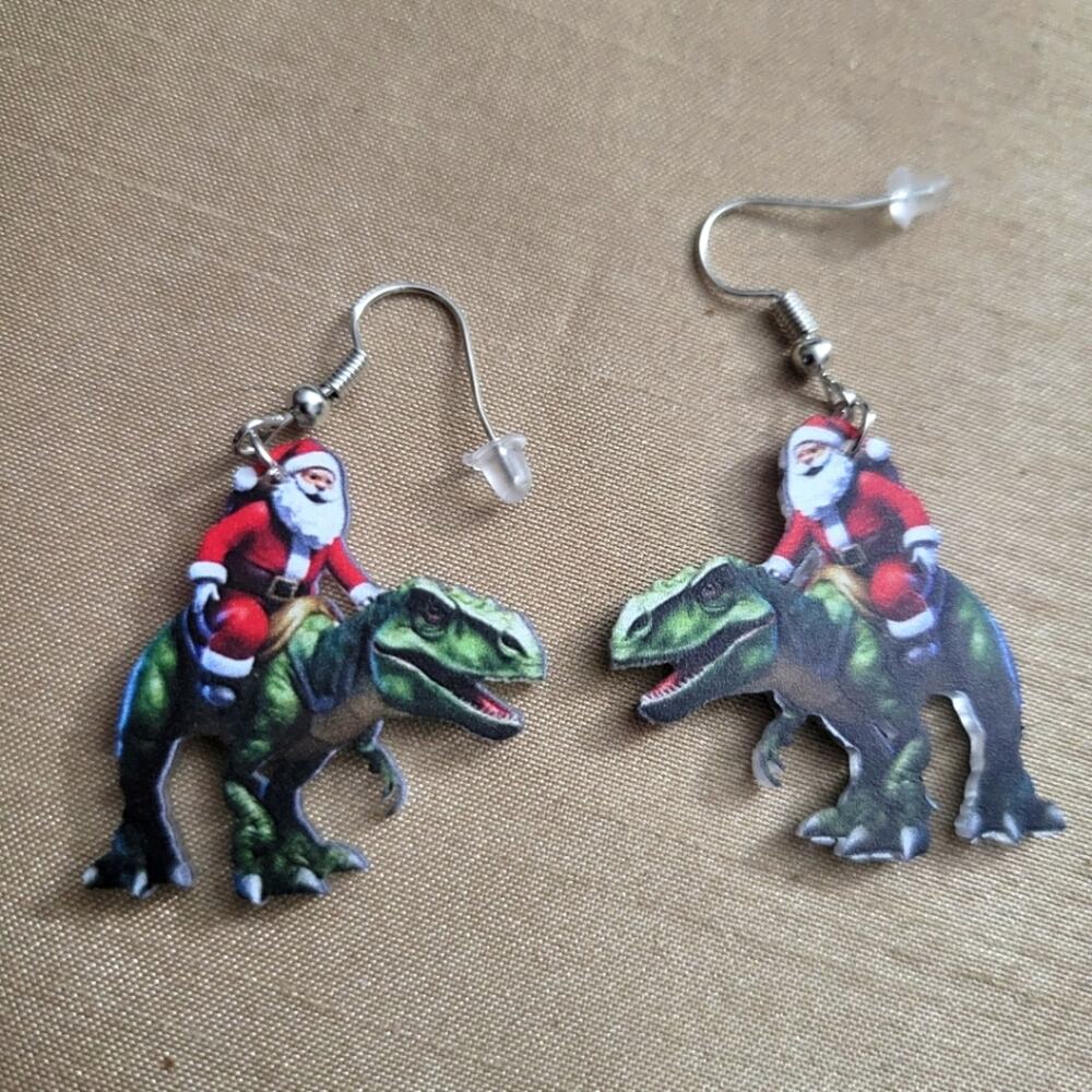 Santa riding T-rex Christmas earrings
